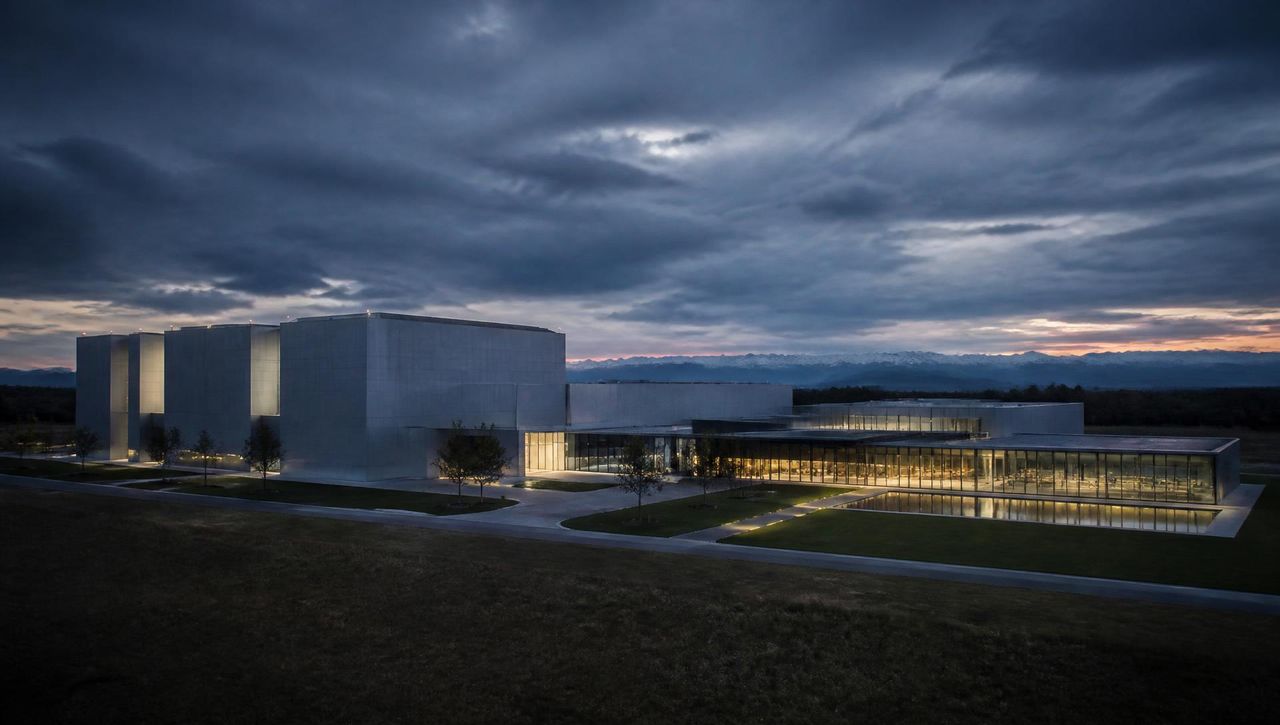 Modern studio campus at dusk with clean architectural lines